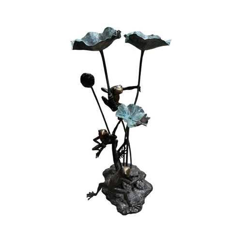 A FINE BRONZE AND GREEN PATINATED FOUNTAIN sculpted with frogs amongst lotus leaves each leaf plumbed for water the base of naturalistic form with leaping frogs 133cm (h)