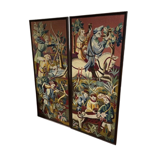 515 - A PAIR OF OAK FRAMED NEEDLEWORK TAPESTRIES depicting medieval style hunting scenes 175cm (h) x 73cm ... 