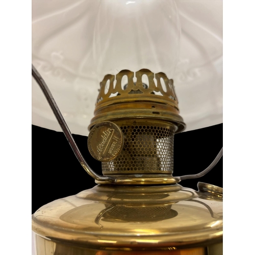 671 - AN ART DECO POLISHED BRASS KEROSENE TABLE LAMP 'Aladdin No. 11' complete with slip chimney and milk ... 