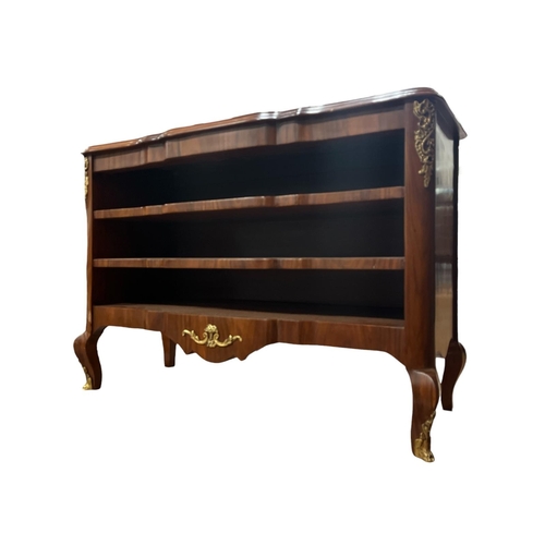 574 - A CONTINENTAL KINGWOOD AND SATINWOOD INLAID OPENFRONT SIDE CABINET of serpentine outline the shaped ... 