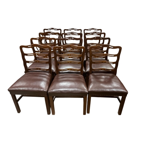 401 - A SET OF TWELVE GEORGIAN STYLE CHINESE CHIPPENDALE DESIGN DINING CHAIRS each with a curved top rail ... 