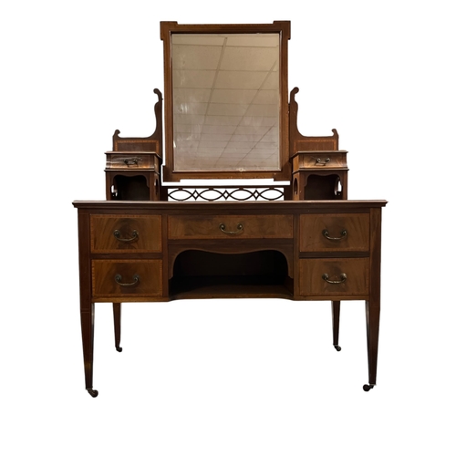 350 - AN EDWARDIAN MAHOGANY AND SATINWOOD INLAID DRESSING TABLE the superstructure with a rectangular beve... 