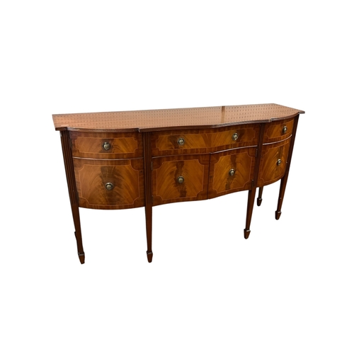 384 - A TEN PIECE MAHOGANY HEPPLEWHITE STYLE DINING ROOM SUITE comprising eight dining chairs, including a... 