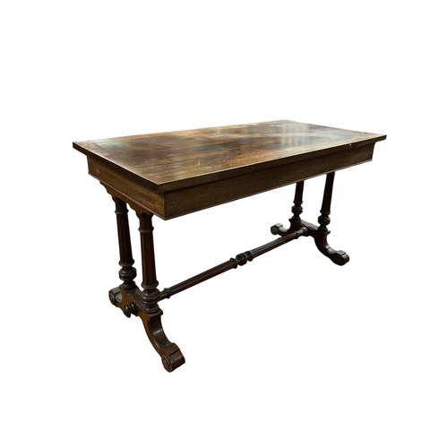 385 - A 19TH CENTURY MAHOGANY CENTRE TABLE of rectangular outline the shaped top with moulded apron raised... 