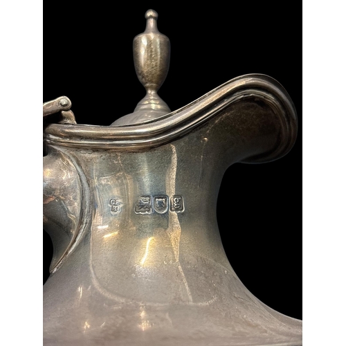 478 - AN EDWARDIAN STERLING SILVER HOT WATER JUG London 1902 460g (14.8 troy oz) total weight including ha... 