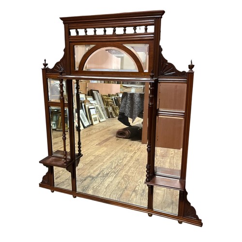 161 - AN EDWARDIAN MAHOGANY OVERMANTEL MIRROR the central rectangular bevelled glass plate enclosed within... 