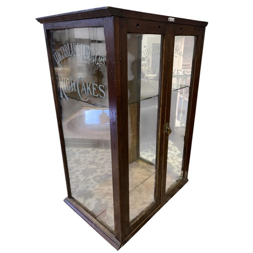AN EARLY 20TH CENTURY GLAZED MAHOGANY SHOP DISPLAY CABINET the glass side panels reading 'MacFarlane, Lang & Co.'s Rich Cakes' 73cm (h) x 50cm (w) x 35cm (d) (AF)