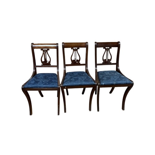 46 - AN EDWARDIAN MAHOGANY DROP LEAF LYRE SIDE TABLE the chamfered side panels opening up onto gate leg s... 