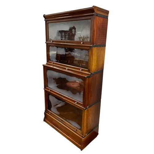 408 - AN EARLY 20TH CENTURY GLOBE WERNICKE BARRISTER BOOKCASE the stacking tiers of pair graduated proport... 