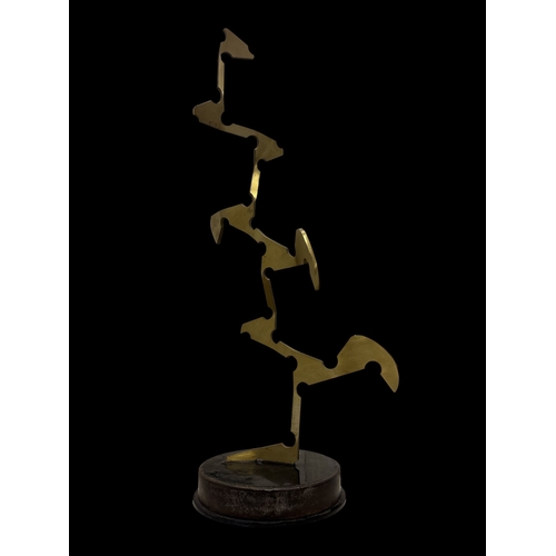 56 - SHANE HOLLAND
'Stride' 
Sculpture 
Brass, steel and resin
Signed, dated and titled to label
64cm (h)... 