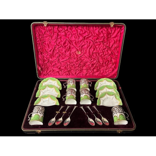 756 - AN EDWARDIAN STERLING SILVER MOUNTED EIGHTEEN PIECE COFFEE SET comprising six sterling silver demita... 