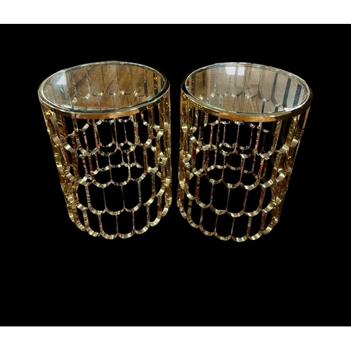467 - A PAIR OF ART DECO STYLE GILT BRASS AND GLAZED END TABLES each of circular outline the shaped top wi... 