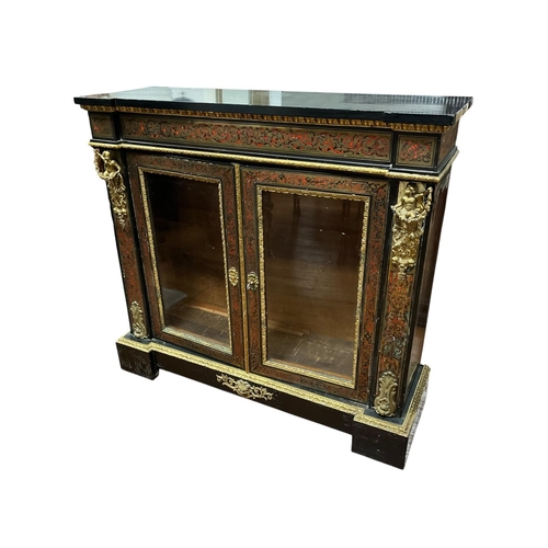 338 - A 19TH CENTURY RED BOULLE LACQUERED AND GILT BRASS MOUNTED SIDE CABINET of inverted breakfront outli... 