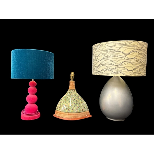 445 - AN IRISH STUDIO POTTERY LAMP of ridged tapering form with embossed stamp to base and label reading '... 