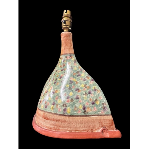 445 - AN IRISH STUDIO POTTERY LAMP of ridged tapering form with embossed stamp to base and label reading '... 