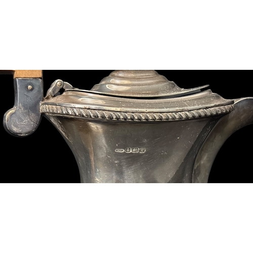 500 - A STERLING SILVER FOUR PIECE TEA AND COFFEE SERVICE comprising creamer, two handled sugar bowl, tea ... 