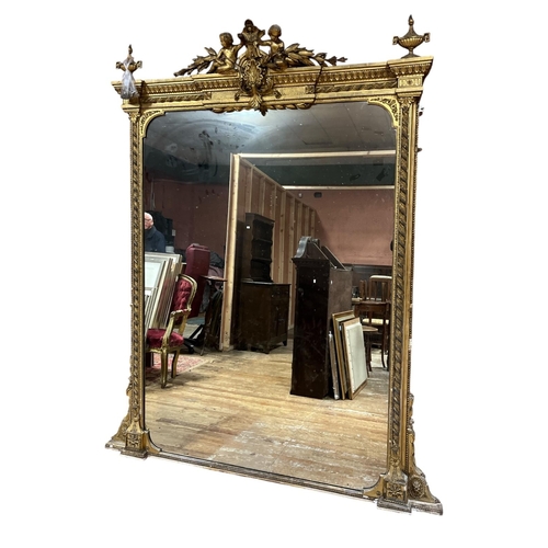534 - A VERY FINE AND IMPRESSIVE 19TH CENTURY GILTWOOD AND GESSO OVERMANTEL MIRROR the rectangular plate w... 