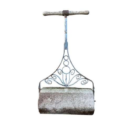 794 - A LARGE 19TH CENTURY IRON FRAMED LAWN ROLLER with turned timber handle over a pierced wrought iron f... 