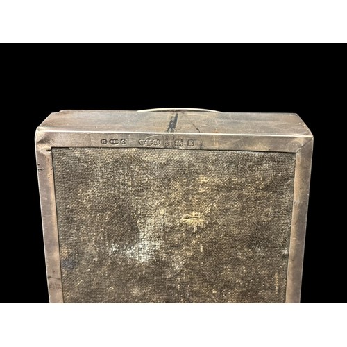 519E - A SILVER ENGINE TURNED LIDDED CASE together with a vintage chrome cigarette case