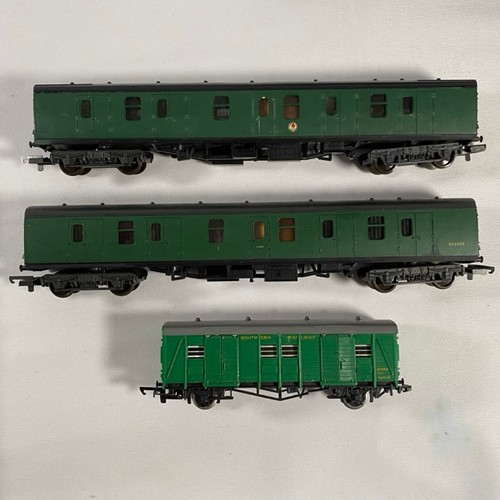 126 - Over 25 OO gauge items of rolling stock to include wagons, coaches, vans and track cleaners (3) and ... 