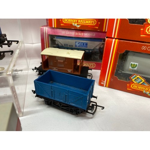 162 - A whole Lot of Hornby Rolling Stock 15 boxed 12 un-boxed 'Ready-to-roll', includes R344 Track Cleani... 