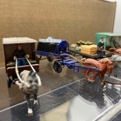 180 - OO gauge figures, animals, horse drawn carts/trucks, milk churns, barrels, coal sacks, station acces... 