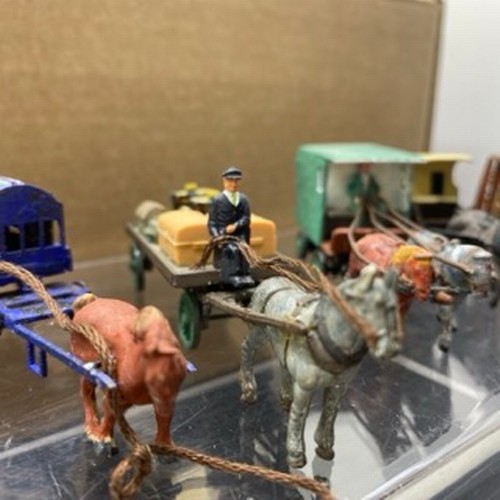 180 - OO gauge figures, animals, horse drawn carts/trucks, milk churns, barrels, coal sacks, station acces... 