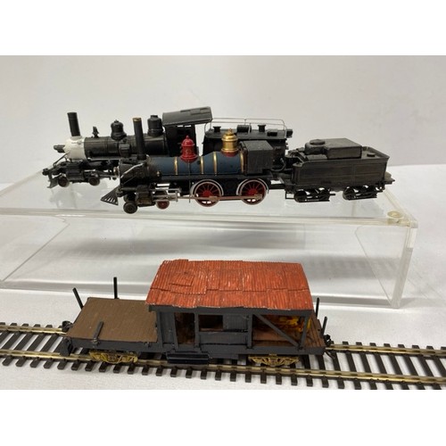 360 - Two Ho gauge North American Locos and motorised Flat-bed with Corrugated Roof, All Tested Non-Runner... 