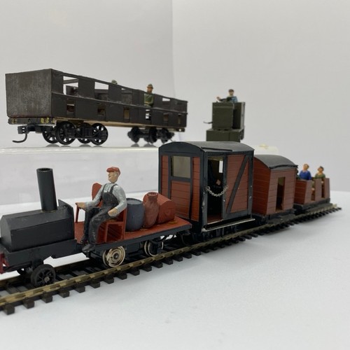 364 - Two On16.5 type Engines with passenger carriage(s) and figures including a cat (1:43.5 scale) runs o... 