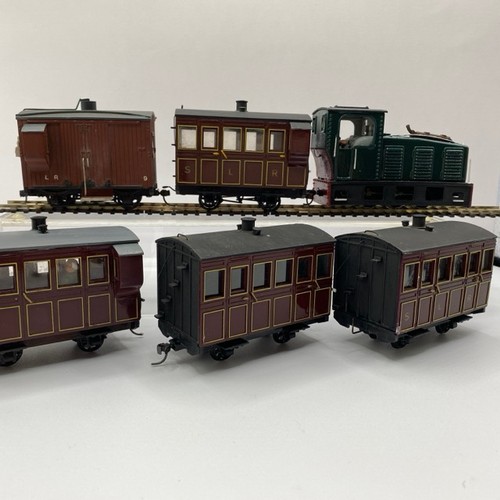 366 - Green & maroon 0-6-0 On16.5 type loco with driver, four coaches and brake wagon (1:43.5 scale) runs ... 