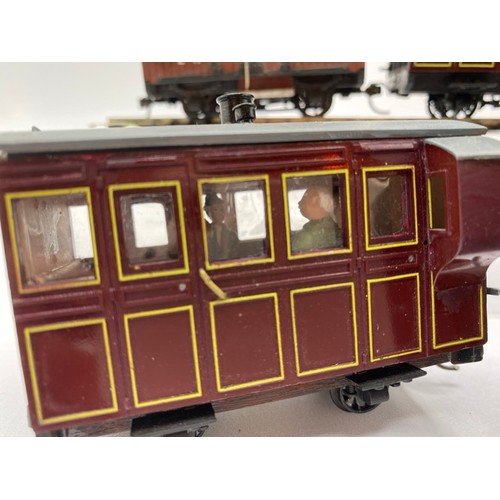 366 - Green & maroon 0-6-0 On16.5 type loco with driver, four coaches and brake wagon (1:43.5 scale) runs ... 