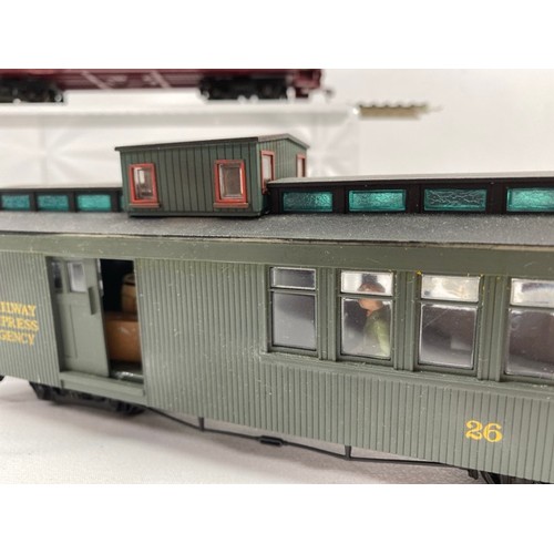 405 - Four On30 Bachmann and kit-built Railway Postal and Passenger coaches, three Bachmann have added acc... 