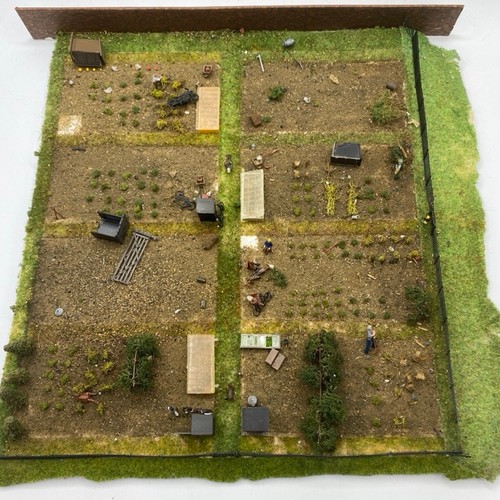 198 - Diorama 'The allotments' depicting eight allotments with sheds, cold frames and gardeners (1/76 scal... 