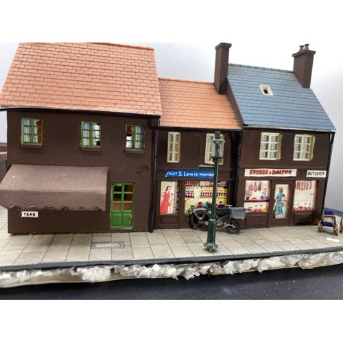 201 - Diorama 'Nipping to the shops' depicting a street corner scene with Butcher, Greengrocers, Tea room ... 