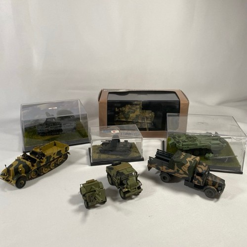 531 - 7 Military vehicles and tanks metal and plastic (various scale), some in display cases, various manu... 