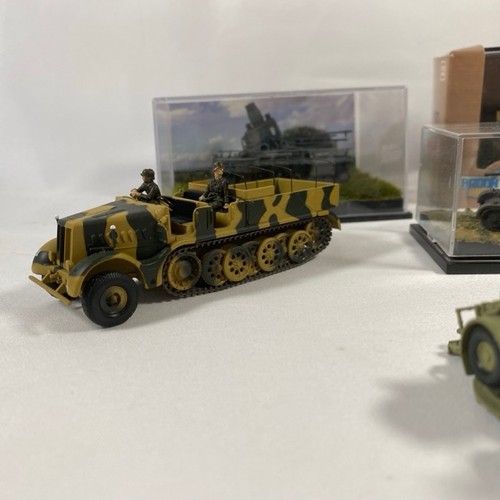 531 - 7 Military vehicles and tanks metal and plastic (various scale), some in display cases, various manu... 