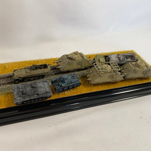 553 - Two 1:144 scale military railroad scenes in two display cases, to include Dragon Can Do 'Leopold' Ge... 