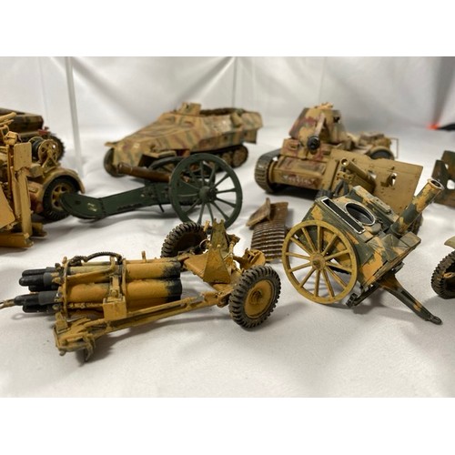 555 - 6 Kit-built plastic tanks & military vehicles and three guns, nicely built and decorated, few loose ... 