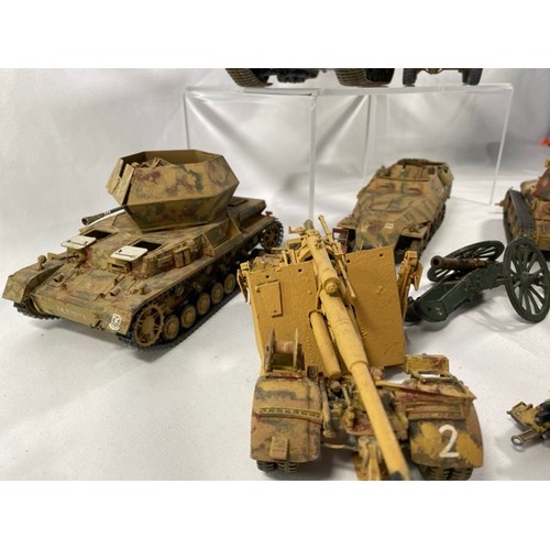 555 - 6 Kit-built plastic tanks & military vehicles and three guns, nicely built and decorated, few loose ... 