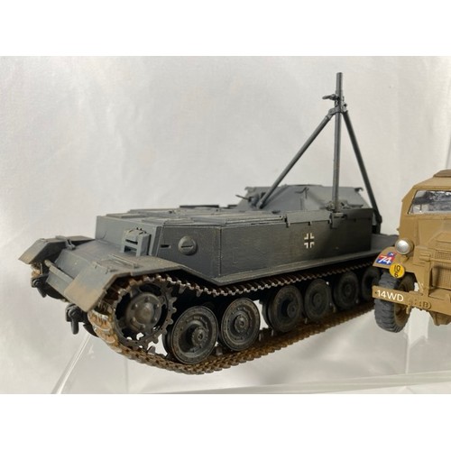 555 - 6 Kit-built plastic tanks & military vehicles and three guns, nicely built and decorated, few loose ... 