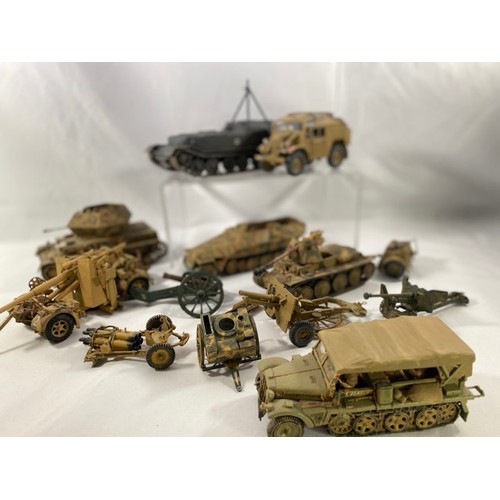 555 - 6 Kit-built plastic tanks & military vehicles and three guns, nicely built and decorated, few loose ... 