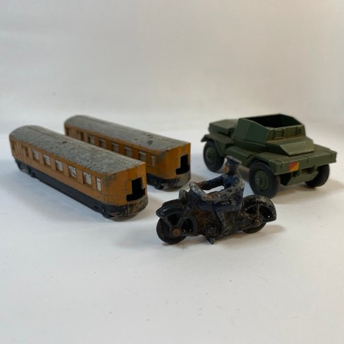 562 - Three Dinky Toys Meccano & unknown die-cast motor cyclist, includes Rail-car x2 (one damaged) and Sc... 