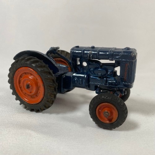 571 - Britains, Dinky, Corgi and Matchbox Farm Agricural vehicles and machines in play worn condition, Cor... 