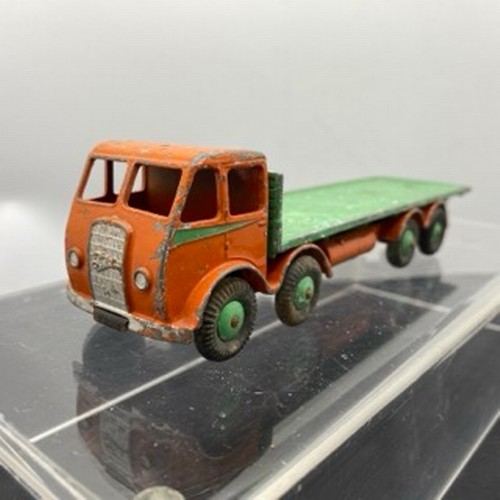 563 - Four Dinky Supertoys Foden Trucks, Dinky 905 Foden Flat Truck with Chains 2nd Type ('Angel Wing' sty... 