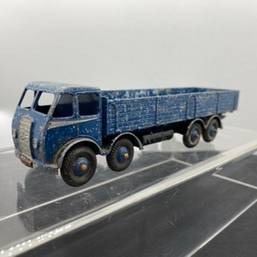 563 - Four Dinky Supertoys Foden Trucks, Dinky 905 Foden Flat Truck with Chains 2nd Type ('Angel Wing' sty... 