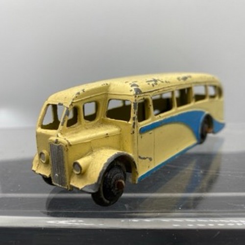 565 - Ten Dinky Toys Bus and Coaches, Dinky Toys 29c Double Decker Bus Red/Cream Owner name etched on base... 