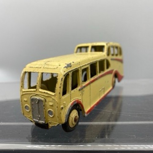 565 - Ten Dinky Toys Bus and Coaches, Dinky Toys 29c Double Decker Bus Red/Cream Owner name etched on base... 