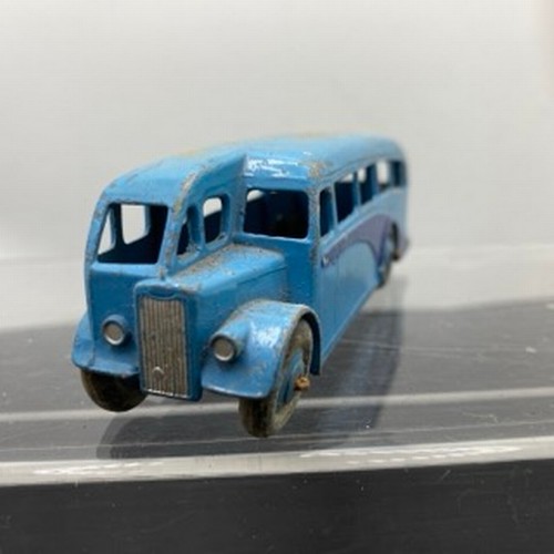 565 - Ten Dinky Toys Bus and Coaches, Dinky Toys 29c Double Decker Bus Red/Cream Owner name etched on base... 