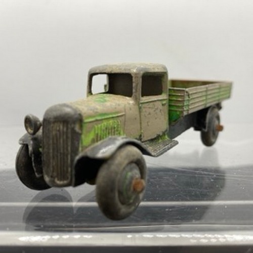 566 - Ten Dinky Toys Trucks/Wagons, Dinky Toys 343 Dodge Farm Tipper Tip Action missing Two flat tyres (F)... 