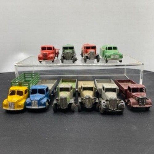 566 - Ten Dinky Toys Trucks/Wagons, Dinky Toys 343 Dodge Farm Tipper Tip Action missing Two flat tyres (F)... 